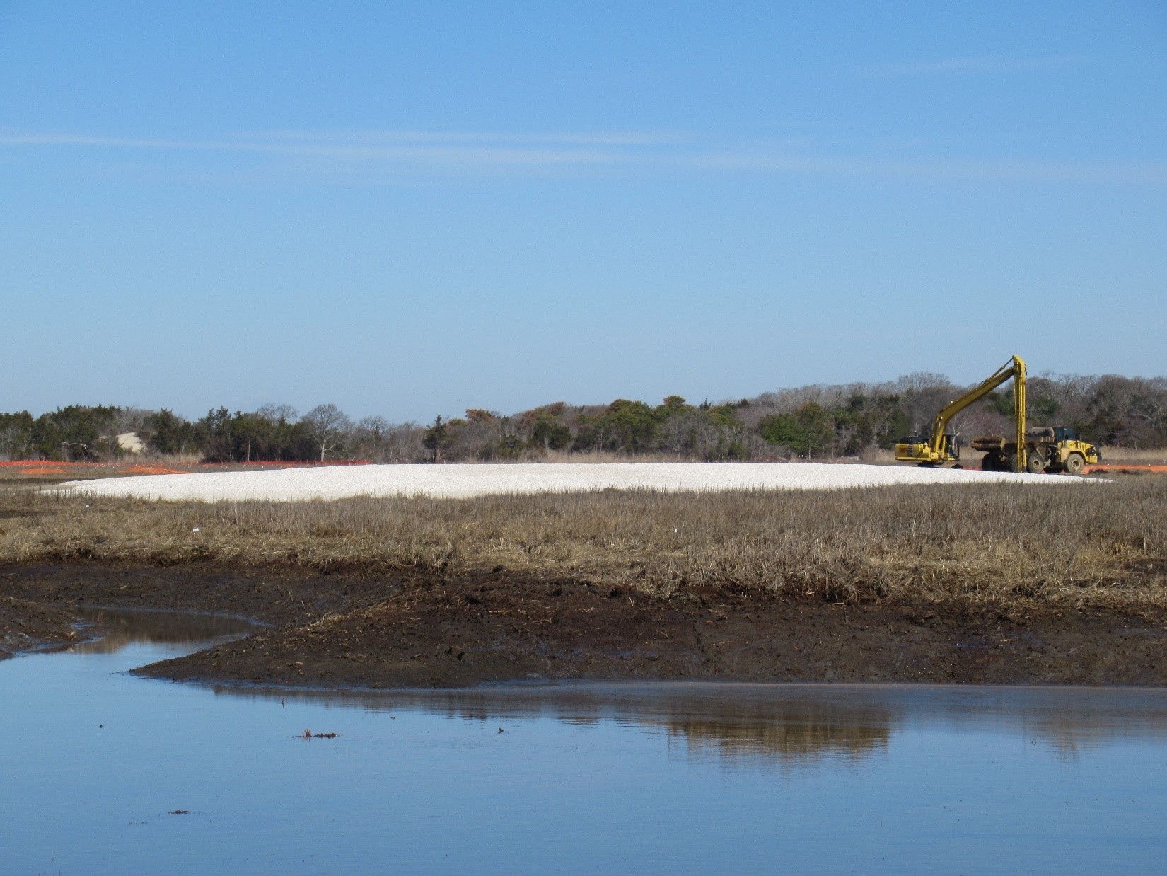 Construction of a sand shell island north of the mainstem of Pond Creek– March 2025