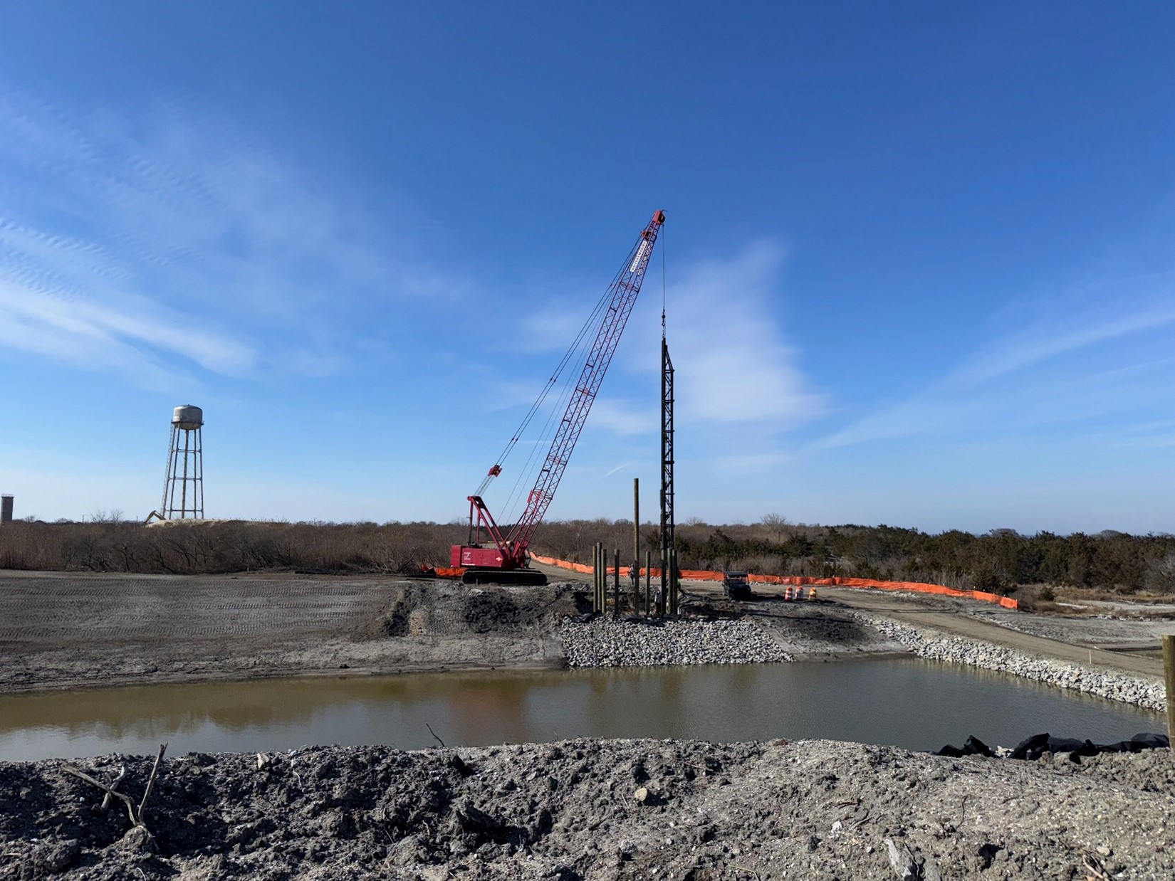 Installation of piles along the south bank of Pond Creek for foundational support of the forthcoming pedestrian bridge – February 2025